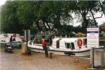 Motor cruisers working through one of the electrically operated locks at Le Somail